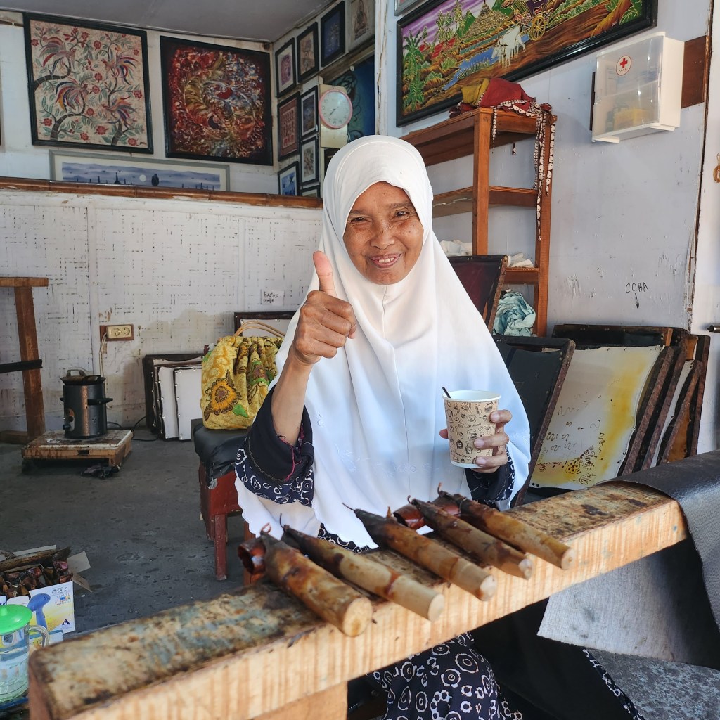 Javanese woman doing Batik in Yogykarta