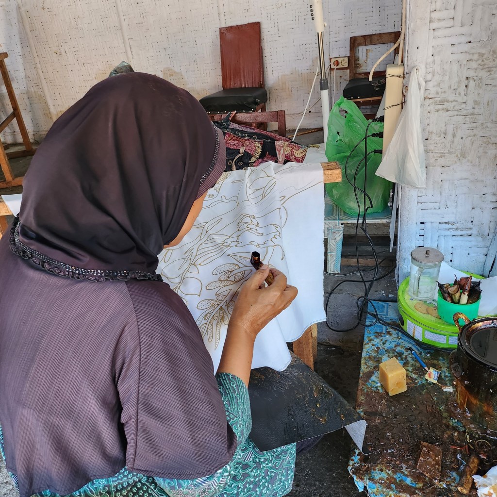 Javanese woman doing Batik in Yogykarta